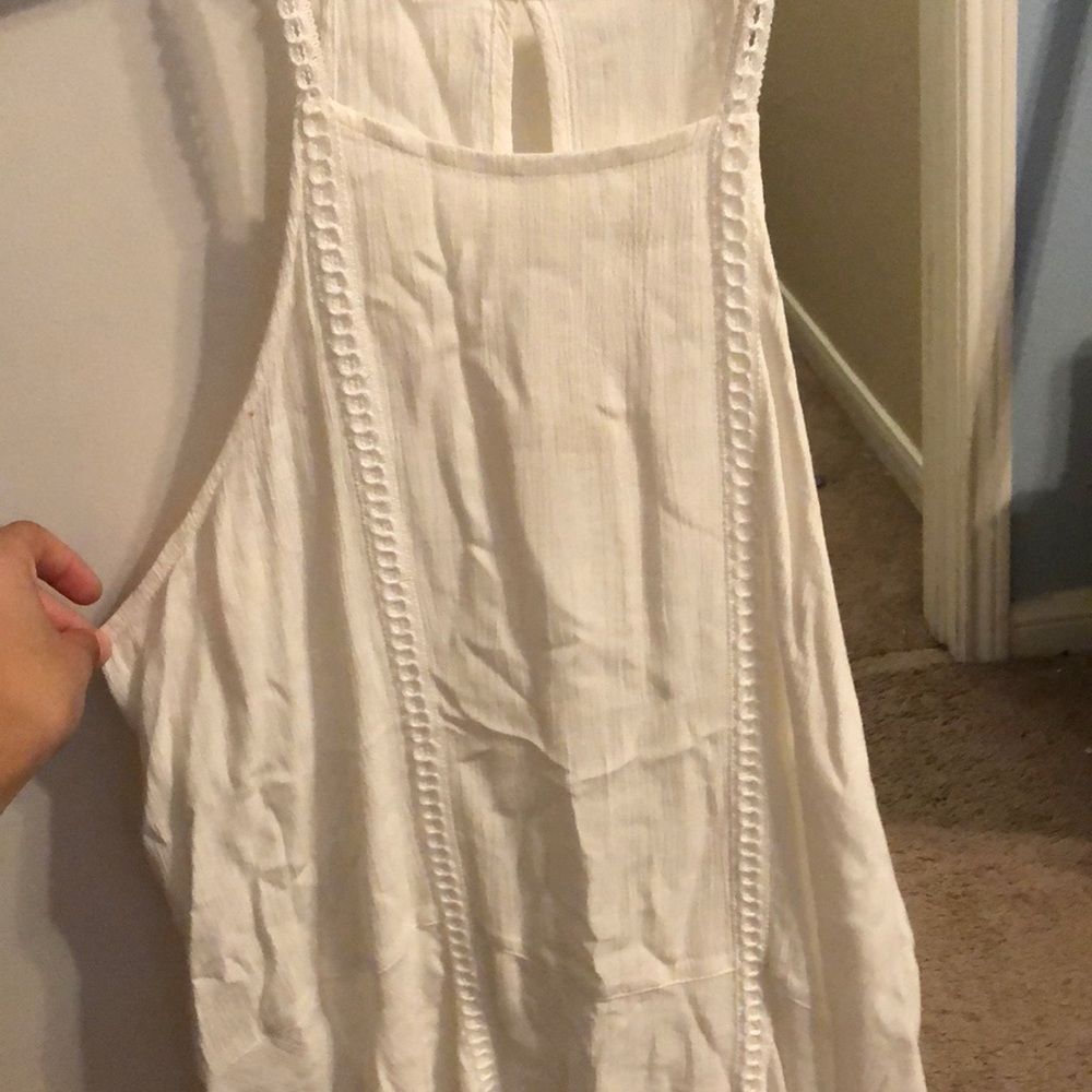 White flowy tank top. Size medium.